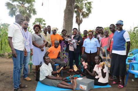 Group with CEO at disbursement